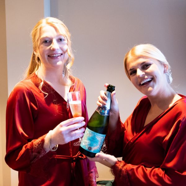 Hannah and Simon at The Merchant Adventurer's Hall - champagne